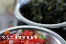 The way you would commonly find kachumbari: diced onions, tomatoes, and coriander.